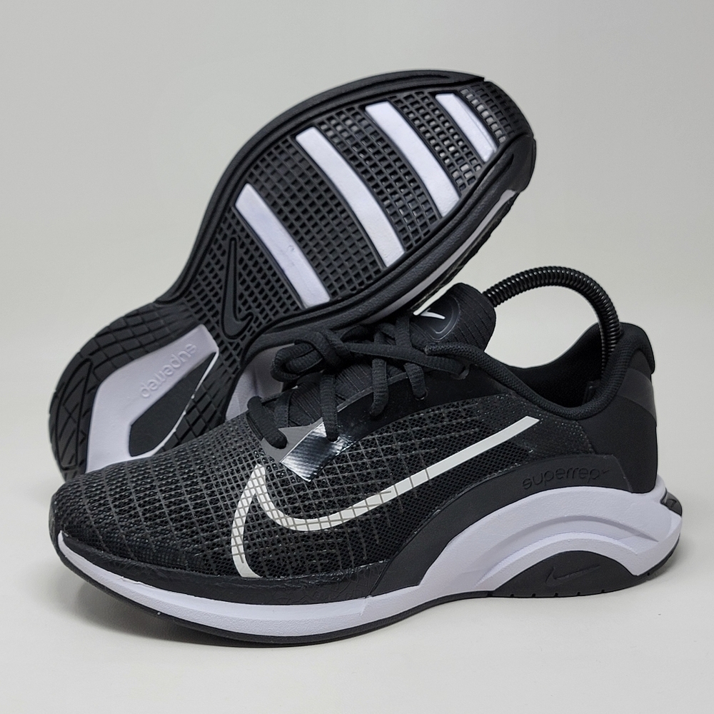 Nike Black and White Athletic Shoes with Swoosh Detail